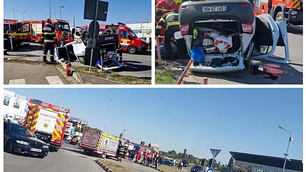 Accident rutier cumplit in Oradea: Masina rasturnata in parcarea unui centru comercial 