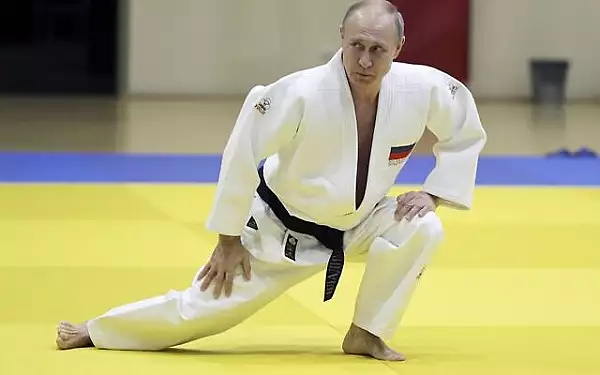 Campioni olimpici rusi exclusi de la mondialele de taekwondo din cauza sustinerii lui Putin