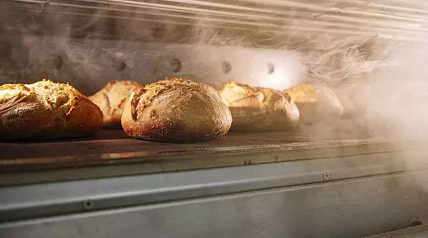 Colosul strain care a preluat compania ce produce una dintre cele mai iubite paini din Romania