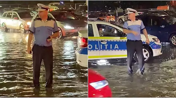 "El este seful politistilor rutieri din Bucuresti". Cu apa pana la genunchi, in mijlocul intersectiei, ajutandu-i pe soferii blocati in trafic dupa furtuna