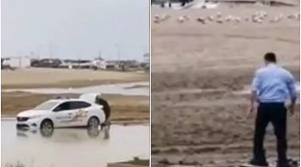 Imagini demne de "cascadorii rasului" | Doi politisti din Constanta au ramas cu masina impotmolita pe plaja: "Si-a bagat picioarele in saci de gunoi"