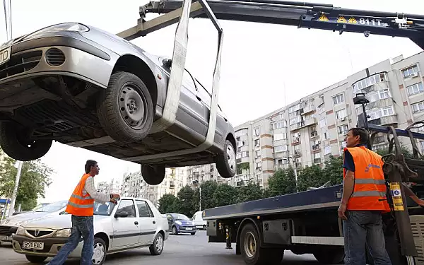 Iti ridica masina cand nu te astepti, chiar si daca este parcata regulamentar. Cum s-a schimbat Codul Rutier in Romania