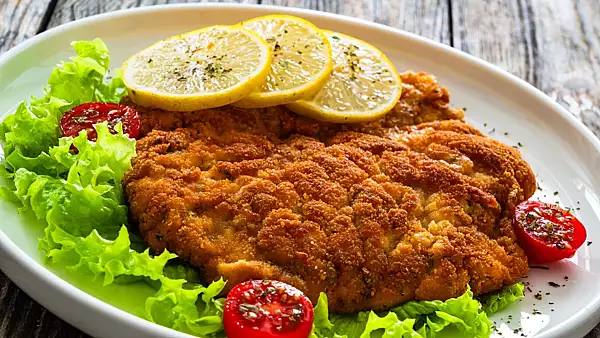 Snitel vienez sau Wiener Schnitzel. Reteta traditionala austriaca