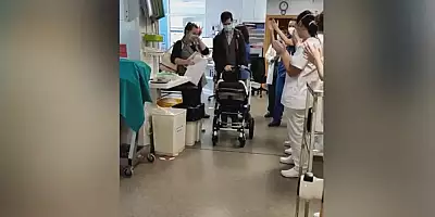 VIDEO Un bebelus de origine romana din Spania a scapat de COVID-19 dupa 70 de zile la terapie intensiva. Copilul a parasit spitalul in uralele personalului medi