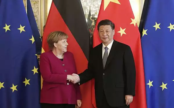 Xi Jinping o lauda pe Angela Merkel: O ,,prietena veche" a Chinei
